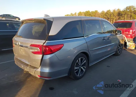 2018 Honda Odyssey Elite z USA, uszkodzony, nr VIN 5FNRL6H91JB099497